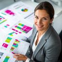 Marketing consultant reviewing a PDF report with colourful charts on a desk